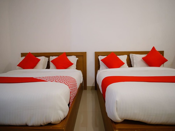 Imagen de la habitación del Hotel OYO 26964 Palm View Residency. Foto 10