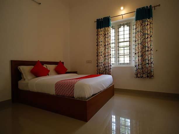 Imagen de la habitación del Hotel OYO 26964 Palm View Residency. Foto 13