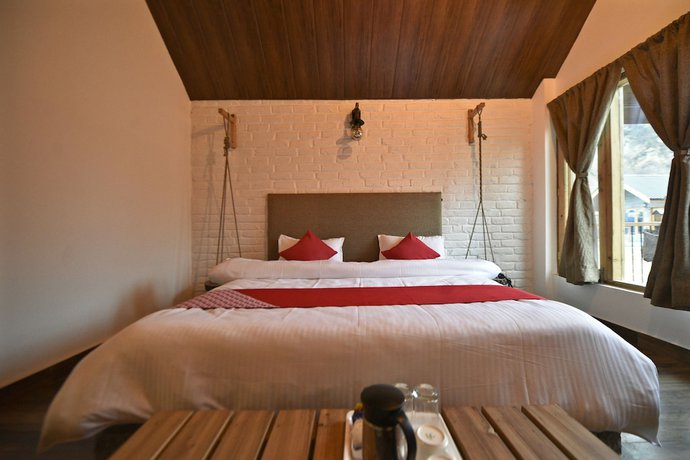 Imagen de la habitación del Hotel OYO 26982 The Stay (luxury Chalet). Foto 12