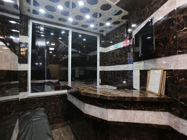 Imagen de los interiores del Hotel OYO 27002 H S R Ram Bazaar. Foto 18