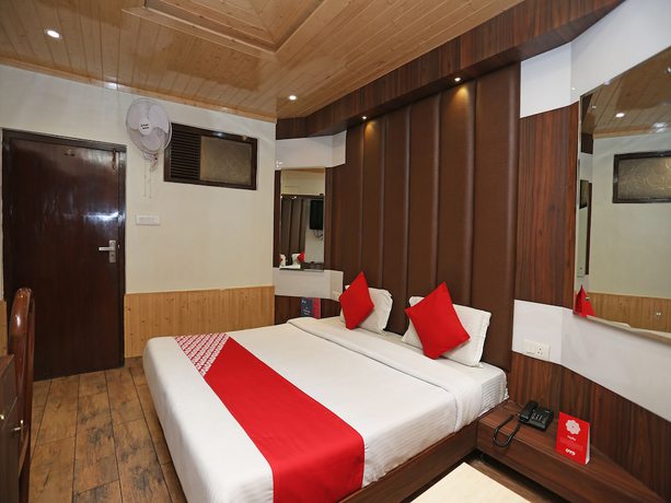 Imagen de la habitación del Hotel OYO 27002 H S R Ram Bazaar. Foto 12