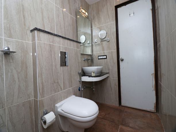 Imagen de la habitación del Hotel OYO 27054 New Sundaram. Foto 8