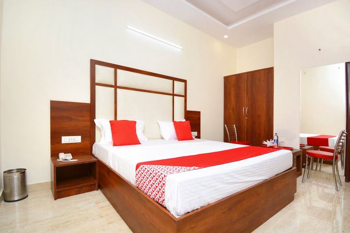 Imagen de la habitación del Hotel OYO 27061 Magnum. Foto 5