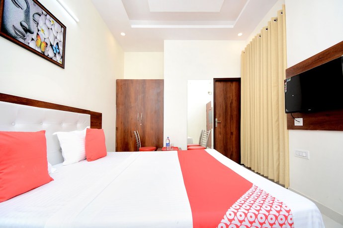 Imagen de la habitación del Hotel OYO 27061 Magnum. Foto 10