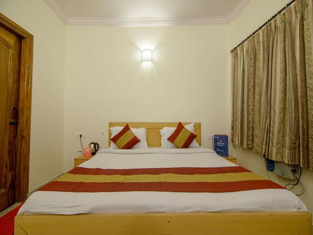 Imagen de la habitación del Hotel OYO 2729 HV International. Foto 2