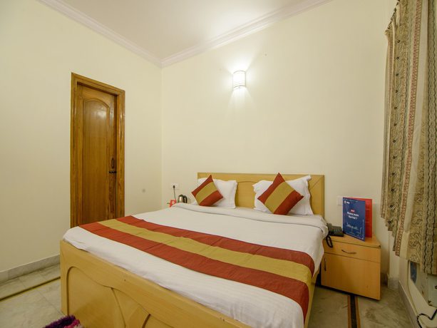 Imagen de la habitación del Hotel OYO 2729 HV International. Foto 6