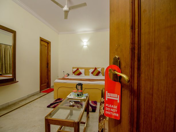 Imagen de la habitación del Hotel OYO 2729 HV International. Foto 8