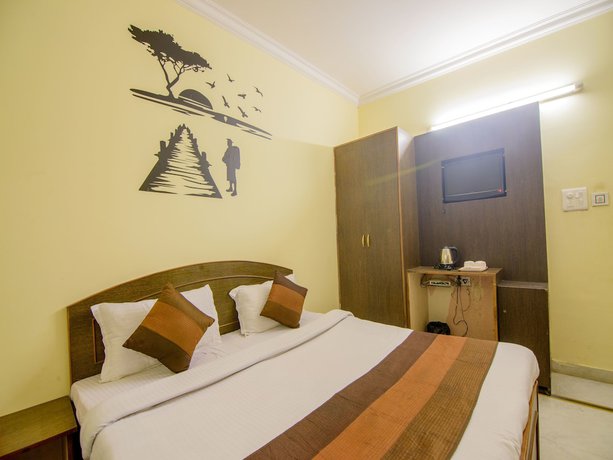 Imagen de la habitación del Hotel OYO 2729 HV International. Foto 9