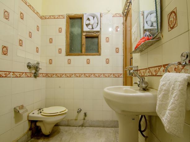 Imagen de la habitación del Hotel OYO 2729 HV International. Foto 14