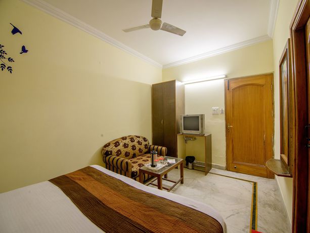 Imagen de la habitación del Hotel OYO 2729 HV International. Foto 17