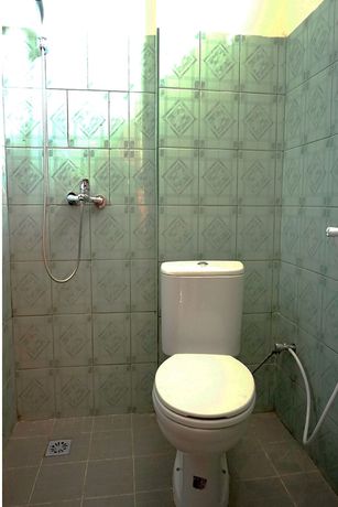 Imagen de la habitación del Hotel OYO 2731 MIM Guest House Syariah. Foto 7