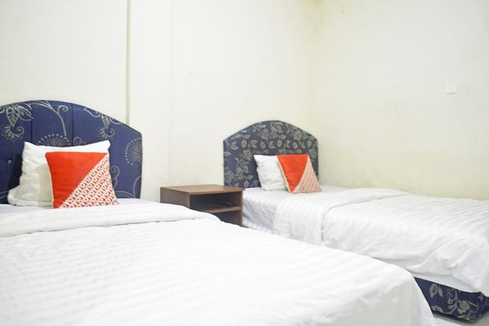 Imagen de la habitación del Hotel OYO 2731 MIM Guest House Syariah. Foto 9