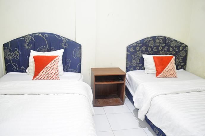 Imagen de la habitación del Hotel OYO 2731 MIM Guest House Syariah. Foto 11