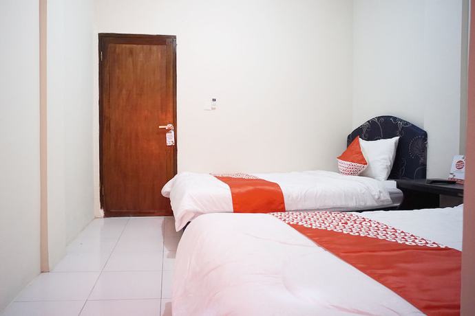 Imagen de la habitación del Hotel OYO 2731 MIM Guest House Syariah. Foto 16