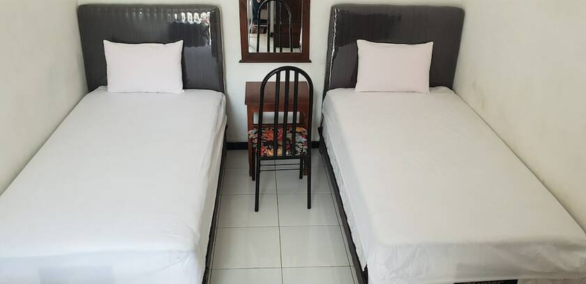 Imagen de la habitación del Hotel OYO 2753 Irma\'s Residence. Foto 16