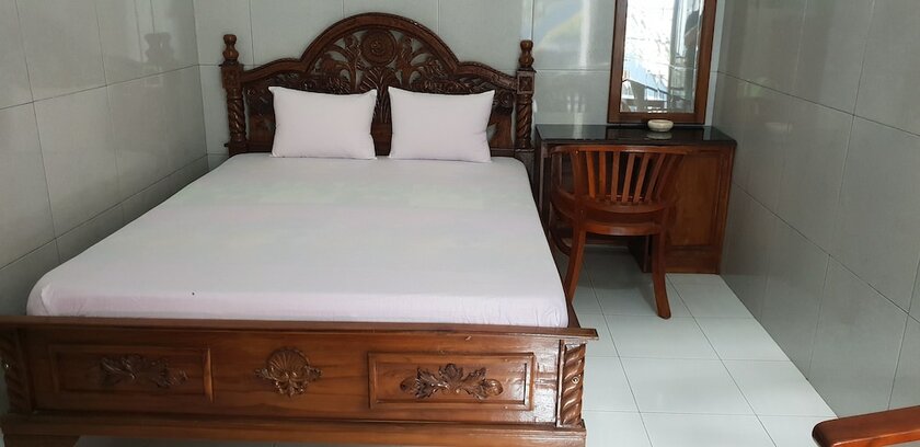 Imagen de la habitación del Hotel OYO 2753 Irma\'s Residence. Foto 17