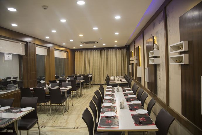 Imagen del bar/restaurante del Hotel OYO 2754 near City Centre. Foto 2