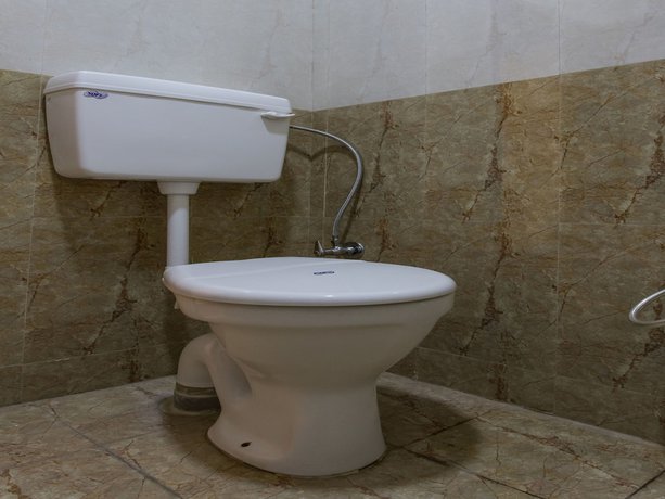 Imagen de la habitación del Hotel OYO 2760 Chanakya. Foto 6