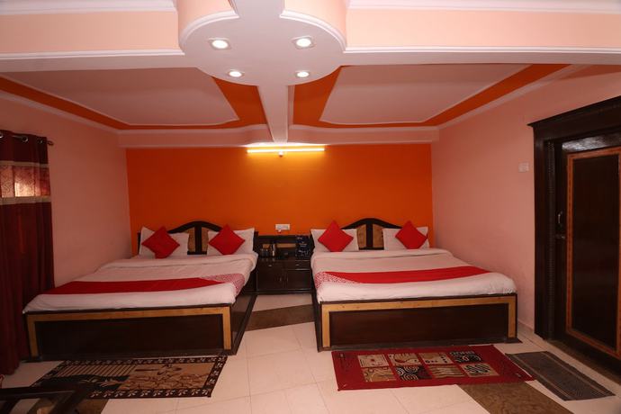 Imagen de la habitación del Hotel OYO 27612 Maitri Holiday Home. Foto 10