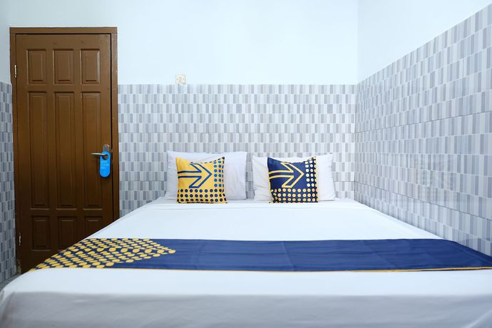 Imagen de la habitación del Hotel OYO 2766 Kezia Kost. Foto 5