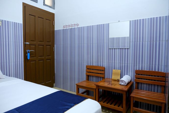 Imagen de la habitación del Hotel OYO 2766 Kezia Kost. Foto 6