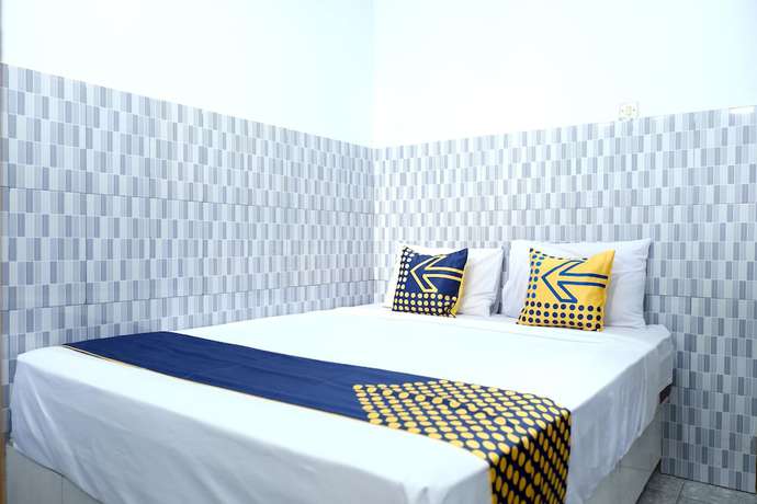 Imagen de la habitación del Hotel OYO 2766 Kezia Kost. Foto 7