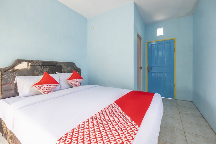 Imagen de la habitación del Hotel OYO 2775 RF Homestay. Foto 4