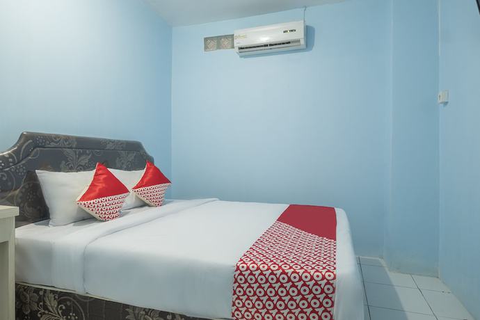 Imagen de la habitación del Hotel OYO 2775 RF Homestay. Foto 6