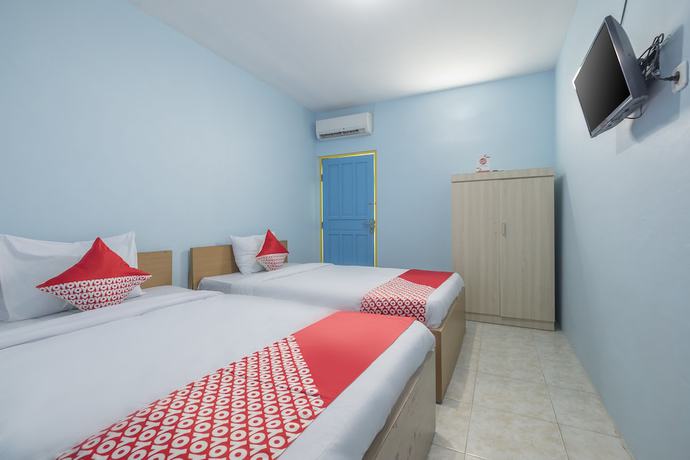 Imagen de la habitación del Hotel OYO 2775 RF Homestay. Foto 11
