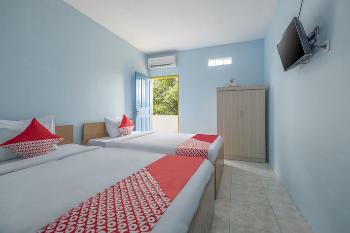 Imagen de la habitación del Hotel OYO 2775 RF Homestay. Foto 13