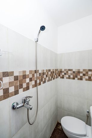 Imagen de la habitación del Hotel OYO 2782 Puspa Residence. Foto 13