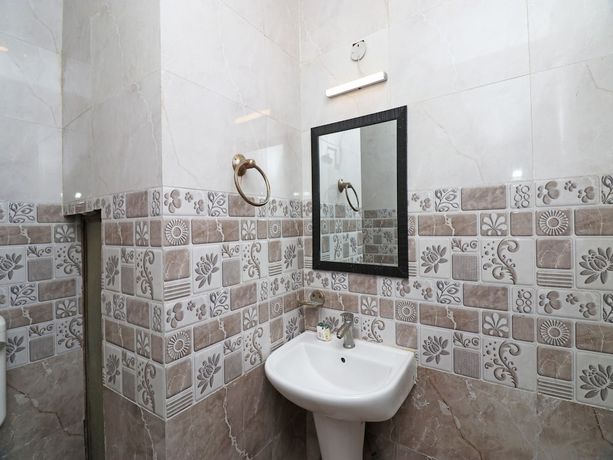 Imagen de la habitación del Hotel OYO 27921 Shalimar. Foto 6