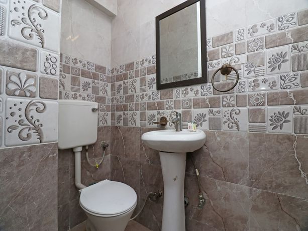 Imagen de la habitación del Hotel OYO 27921 Shalimar. Foto 10