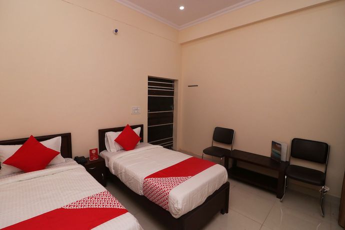 Imagen de la habitación del Hotel OYO 27941 Sangam Darshan. Foto 11