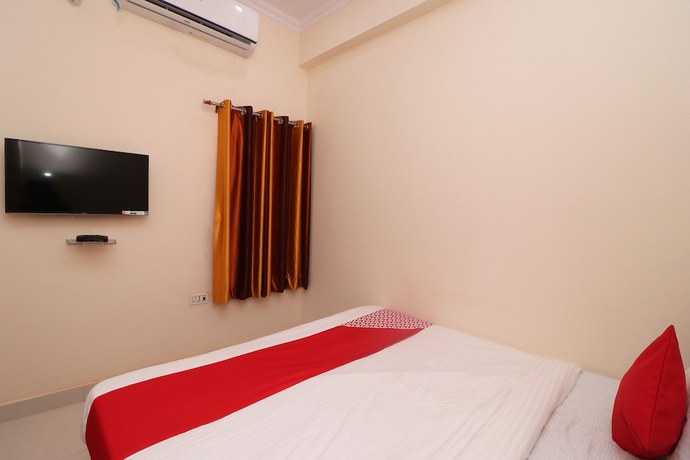 Imagen de la habitación del Hotel OYO 27941 Sangam Darshan. Foto 12