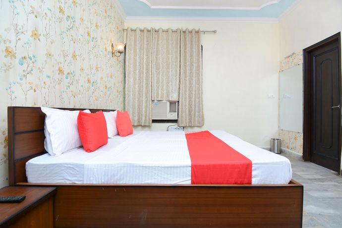 Imagen de la habitación del Hotel OYO 27959 Ra-flora. Foto 10