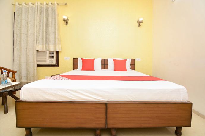 Imagen de la habitación del Hotel OYO 27959 Ra-flora. Foto 12
