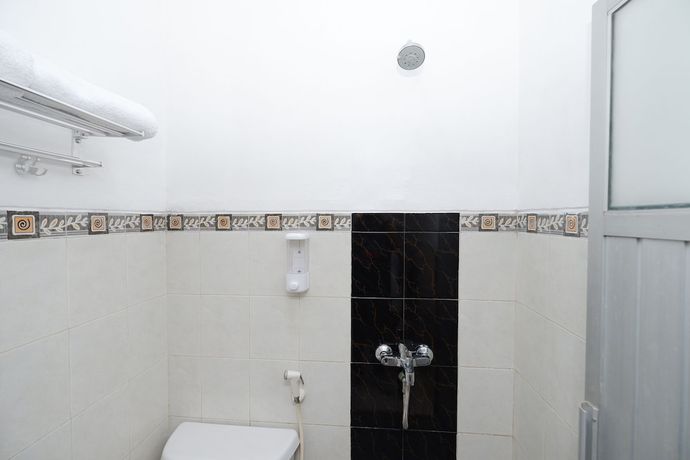 Imagen de la habitación del Hotel OYO 2803 Orchid House. Foto 6
