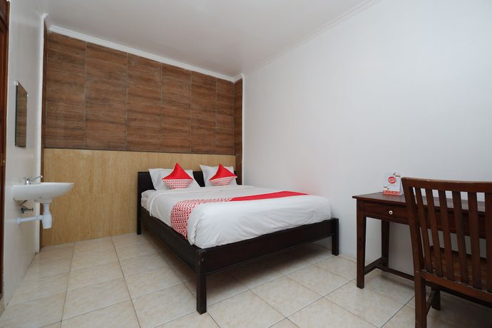 Imagen de la habitación del Hotel OYO 2803 Orchid House. Foto 14