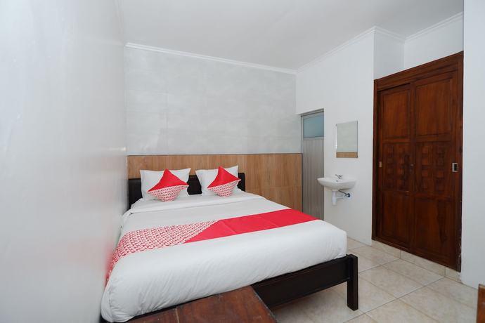 Imagen de la habitación del Hotel OYO 2803 Orchid House. Foto 17