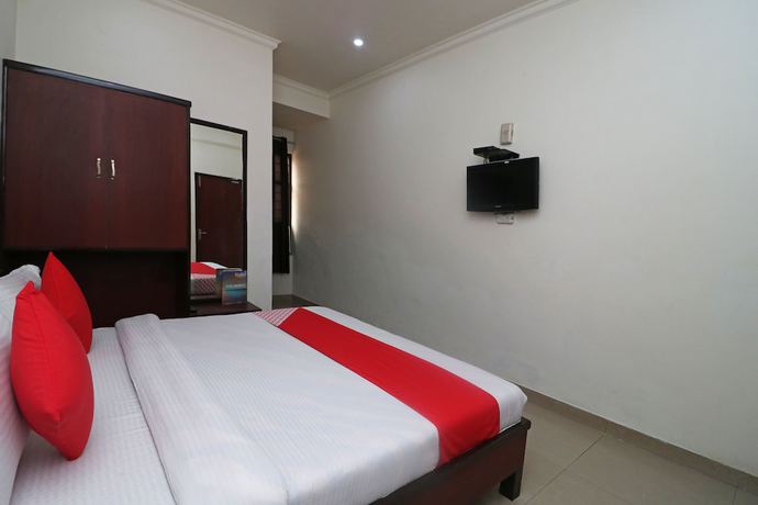 Imagen de la habitación del Hotel OYO 28053 Gayatri Palace. Foto 13
