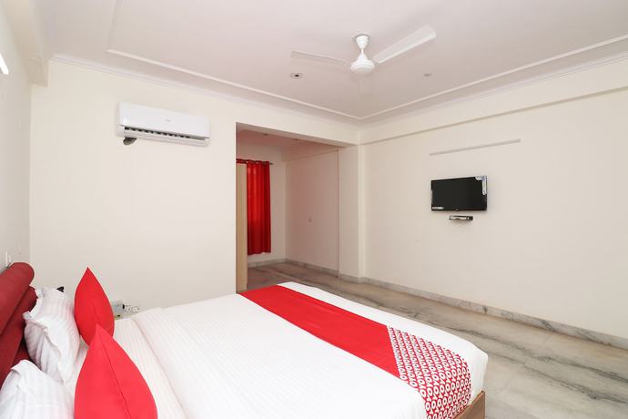 Imagen de la habitación del Hotel OYO 28232 The Golden Circle. Foto 7