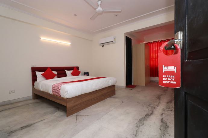 Imagen de la habitación del Hotel OYO 28232 The Golden Circle. Foto 8