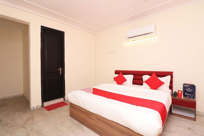 Imagen de la habitación del Hotel OYO 28232 The Golden Circle. Foto 9