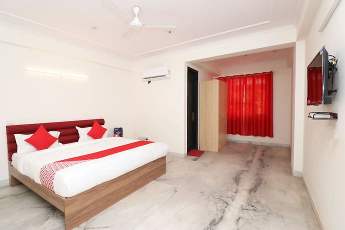 Imagen de la habitación del Hotel OYO 28232 The Golden Circle. Foto 11