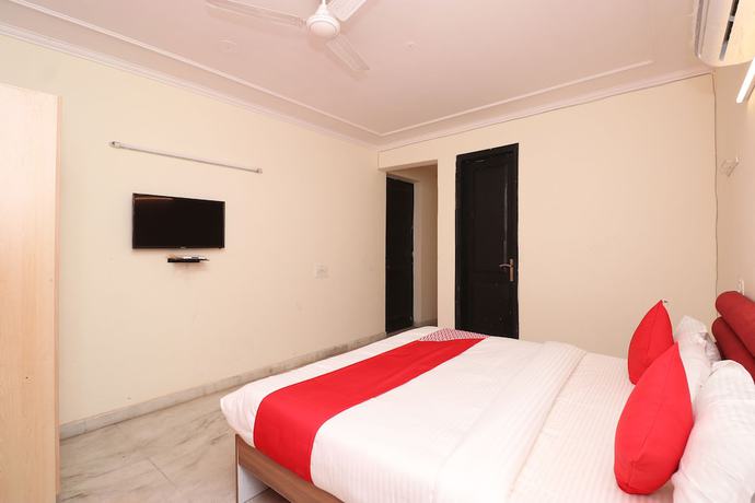 Imagen de la habitación del Hotel OYO 28232 The Golden Circle. Foto 12