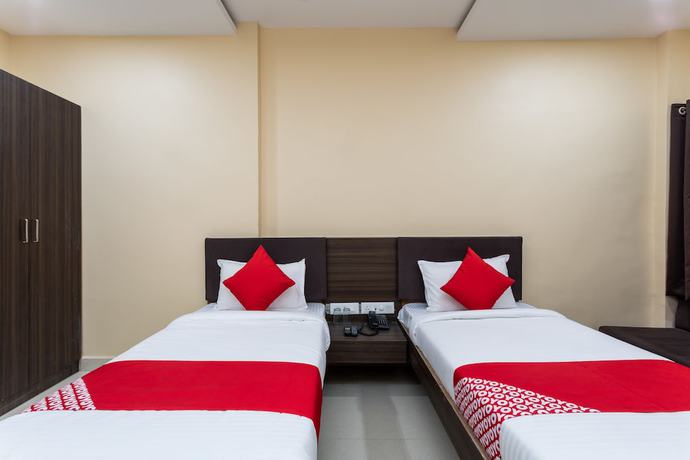 Imagen de la habitación del Hotel OYO 28247 SMR Palace. Foto 6