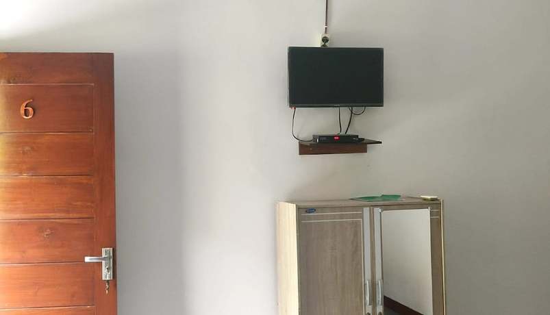 Imagen de la habitación del Hotel OYO 2864 Mangsit Garden Homestay. Foto 4