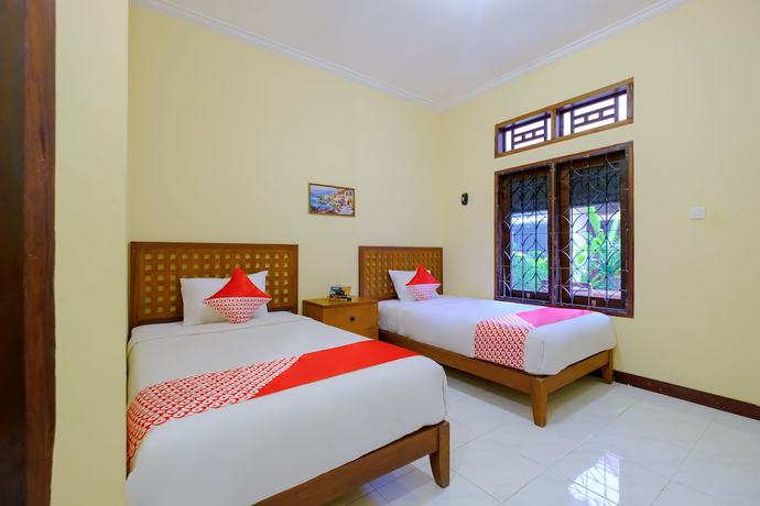 Imagen de la habitación del Hotel OYO 2864 Mangsit Garden Homestay. Foto 10