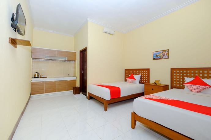 Imagen de la habitación del Hotel OYO 2864 Mangsit Garden Homestay. Foto 14